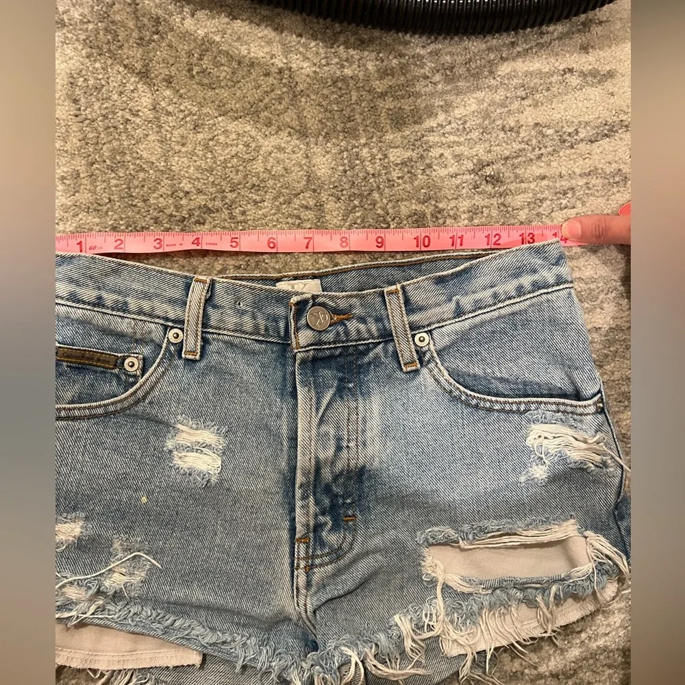 Distressed denim cut off shorts